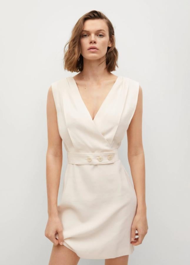 Mango - Vestidos blancos de rebajas. Minivestido con escote cruzado y doble abotonadura, de Mango. Precio: 27,99€