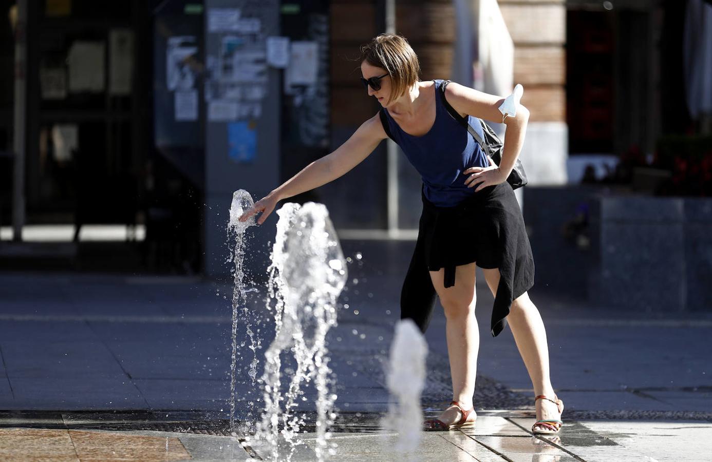 El calor de julio en Córdoba, en imágenes