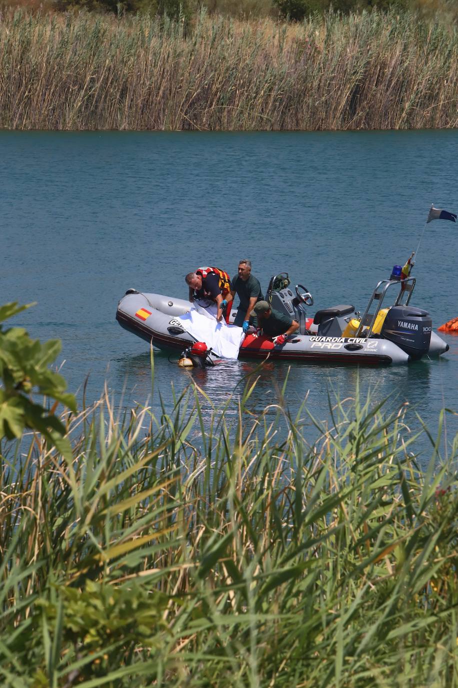 El hallazgo del cuerpo del joven desaparecido en el Lago Azul de Córdoba, en imágenes