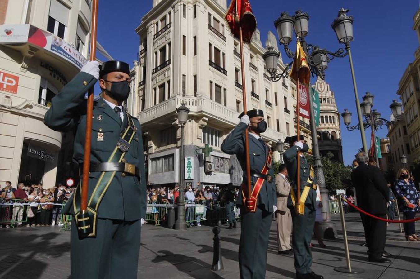 El izado de la bandera de España en los actos de la Guardia Civil por su patrona, en imágenes