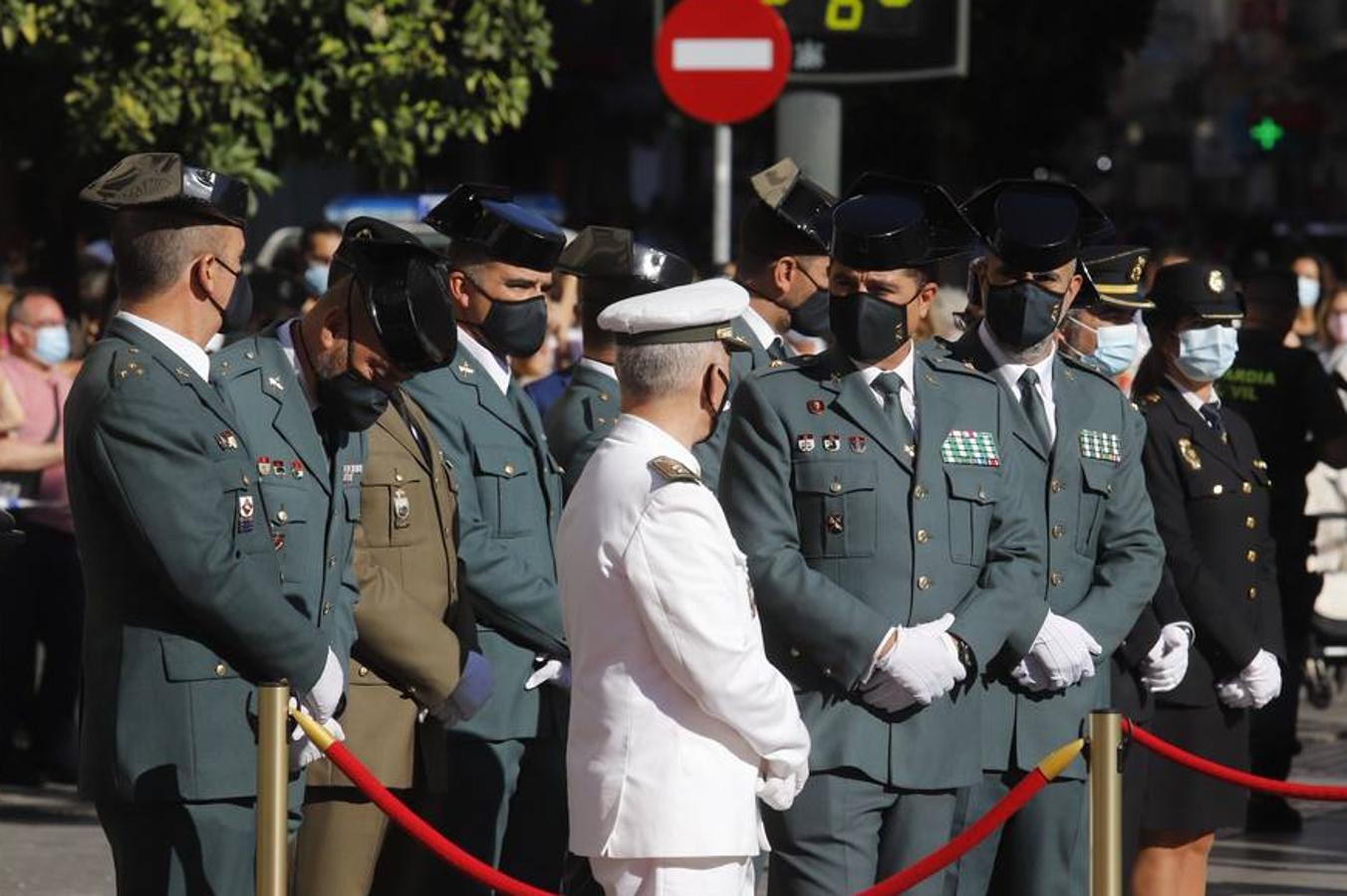 El izado de la bandera de España en los actos de la Guardia Civil por su patrona, en imágenes