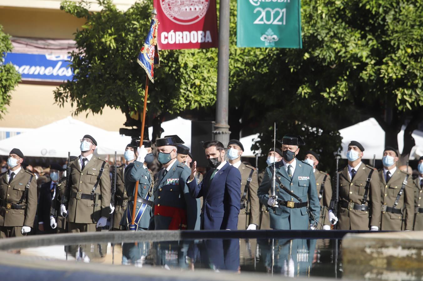 El izado de la bandera de España en los actos de la Guardia Civil por su patrona, en imágenes