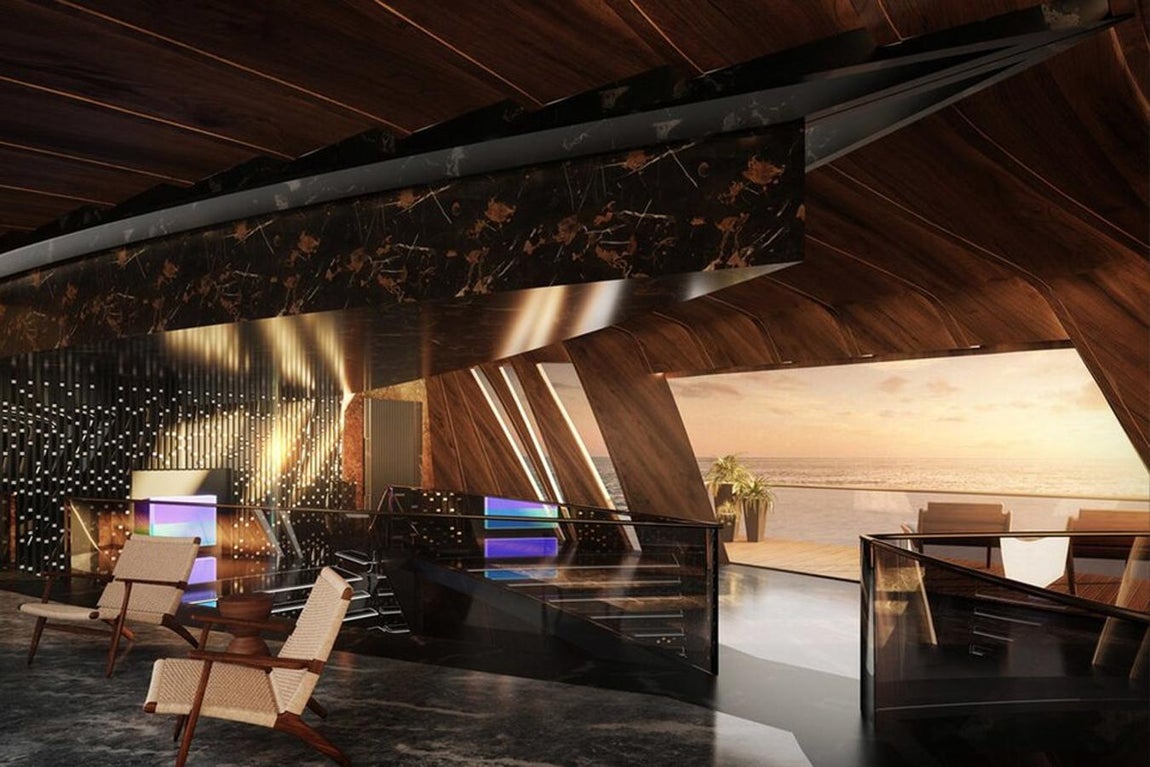 Bond Girl, el trimarán perfecto para espías. Como era de esperar, el interior ha sido planteado para destilar lujo a través de acabados modernistas y vanguardistas en donde se crea un contraste entre el mobiliario y las líneas decorativas. No falta el mármol, los cristales traslúcidos y formas sinuosas.