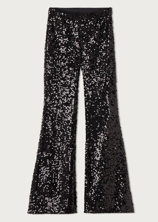 Leggings acampanados con lentejuelas de color negro de Calzedonia (39,95€)