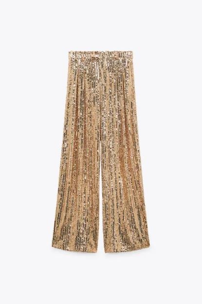Pantalón ancho de lentejuelas doradas de Zara (39,95€)