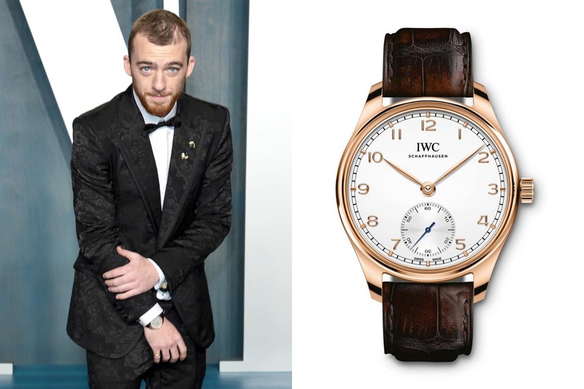 Angus Cloud e IWC. El intérprete escogió el reloj Portugieser Automatic 40 de IWC en una de las fiestas posteriores a la gala. Un reloj automático, con caja de oro de 18 quilates en tamaño de 40.4 mm y correa de piel de aligátor marrón oscuro de Santoni. Su precio es de 17.000 euros.