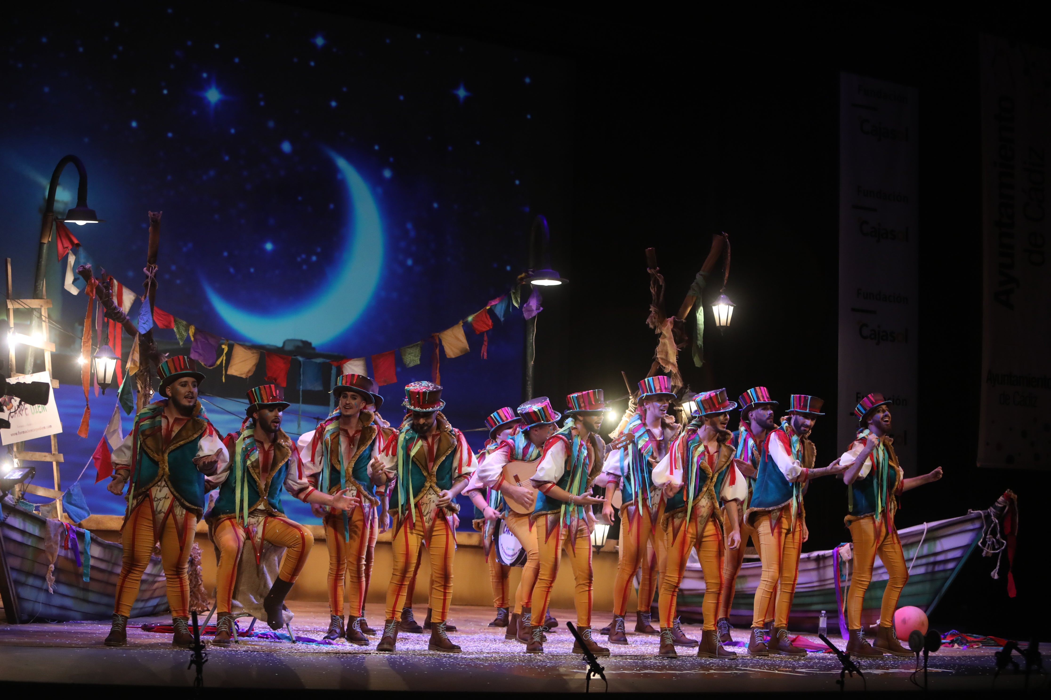 Fotos: Comparsa &#039;Cantando bajo la lluvia&#039; en el COAC 2022. Carnaval de Cádiz