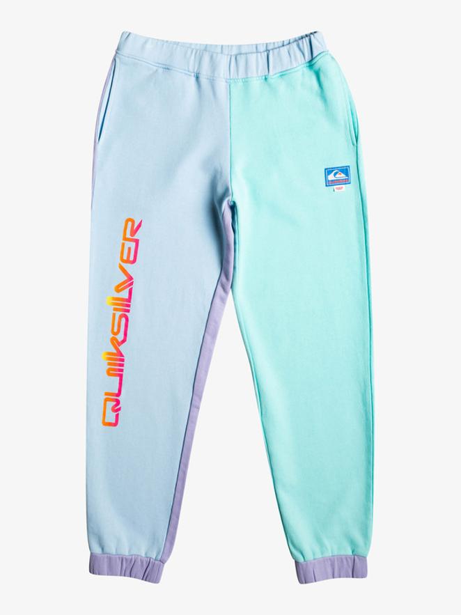 Quicksilver - Prendas inspiradas en Stranger Things. Pantalón de chándal bicolor con cintura alta y el tobillo ligeramente ajustado, , de la colección cápsula de Stranger Things para Quicksilver que reinterpreta las piezas más icónicas de la colección de 1986 de la firma, añadiendo pinceladas de la serie. Precio: 59,99 €.