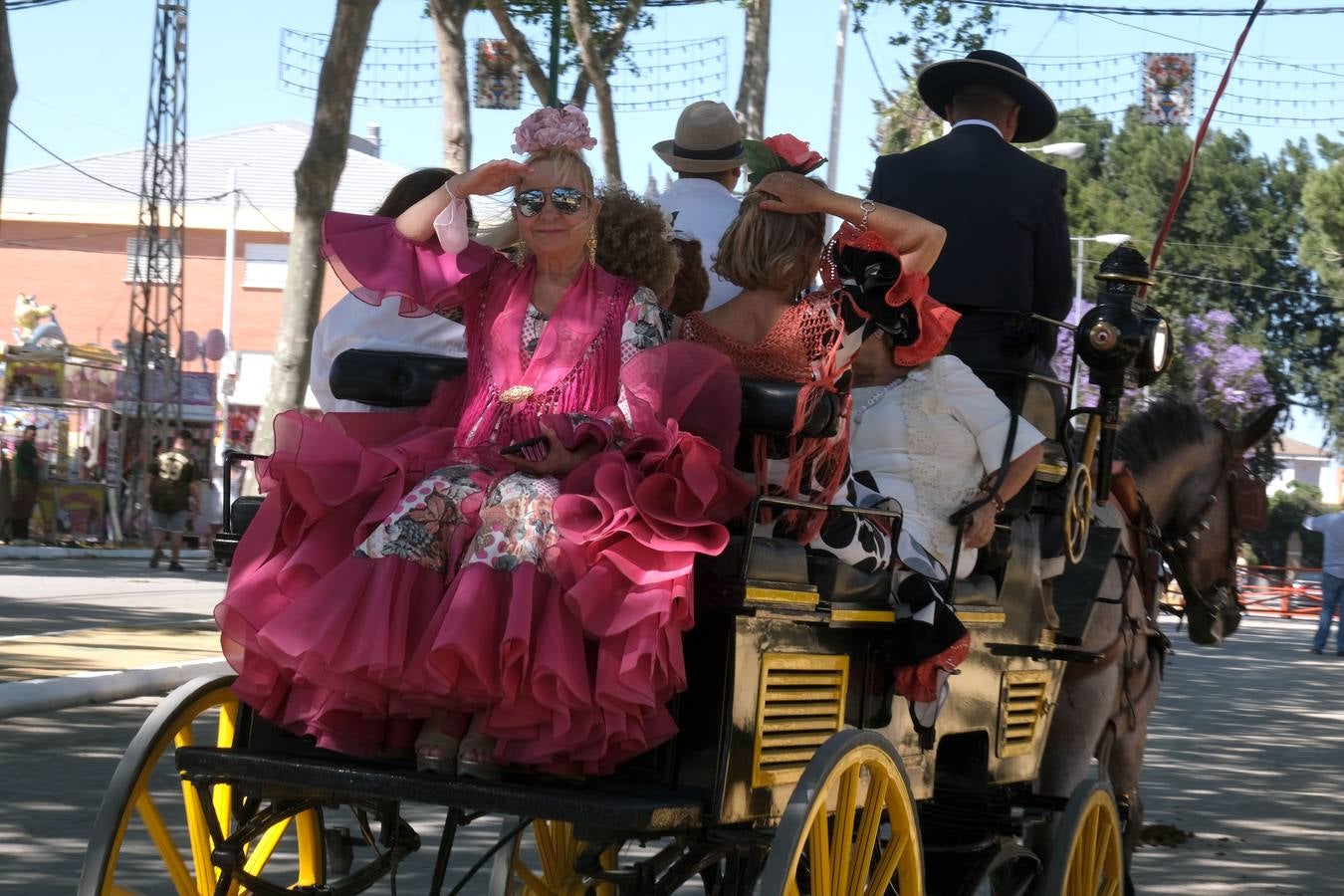 Fotos: Viento y calor en la primera jornada de la Feria de El Puerto en Las Banderas