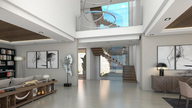 Una villa de lujo frente al mar en Jávea. Destacan sus techos altos, sus suelos de gres porcelánico y sus grandes ventanales que van de suelo a techo y que inundan de luz natural los interiores.