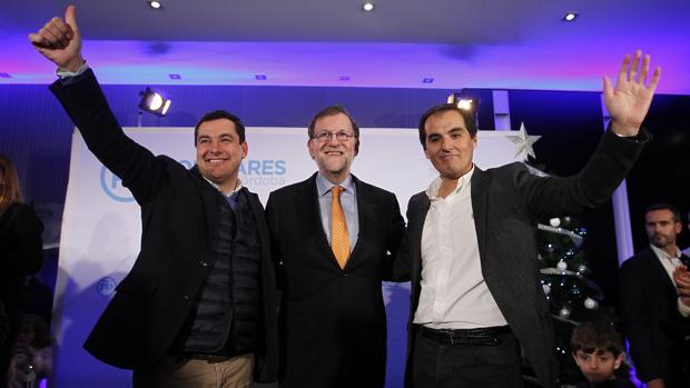 Nieto, con Juanma y Rajoy en un acto del partido en Córdoba