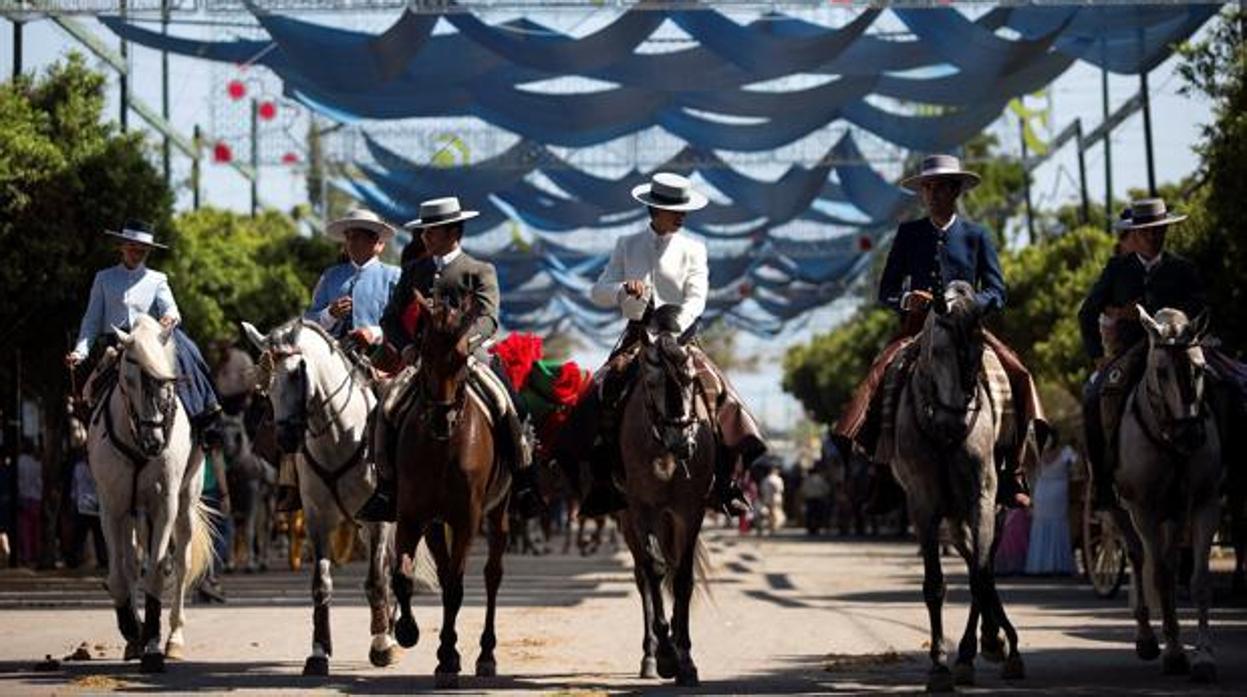 Caballistas en el Real de Cortijo de Torres