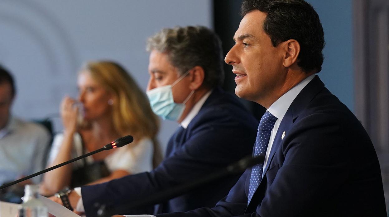 El presidente de la Junta de Andalucía, Juanma Moreno, durante su intervención