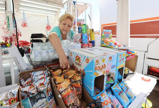 Dolores Torralba, en su puesto de la Feria