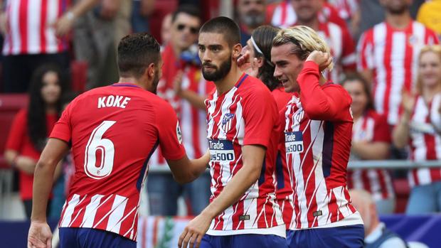 Carrasco y Griezmann tumban a un buen Sevilla en casa