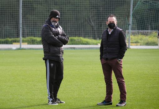 Álvaro Cervera en un entrenamiento con David Navarro.