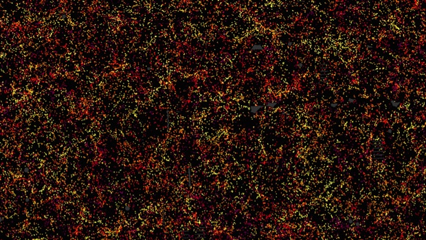 Este es uno de los sectores del mapa de la estructura a gran escala del Universo. Cada punto indidica la posición de una galaxia 6 mil millones de años en el pasado. La imagen cubre aproximadamente 1/20 del cielo. El color indica la distancia de la Tierra, amarillo para las galaxas más cercanas y violeta para las más alejadas. Las galaxias aparecen muy agrupadas, revelando supercúmulos y enormes vacíos cuya existencia se "sembró" en la primera fracción de segundo tras el Big Bang. Esta imagen contiene 48,741 galaxias, alrededor del 3% del conjunto de datos completo del mapa, que incñuye 1.200.000 galaxias