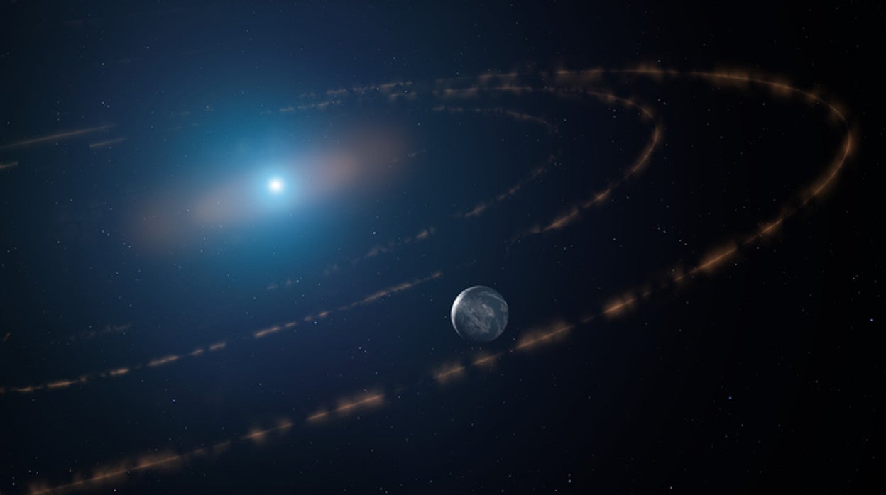 En la ilustración, la enana blanca WD1054-226 aparece rodeada de nubes de escombros y orbitada por un planeta en su zona habitable