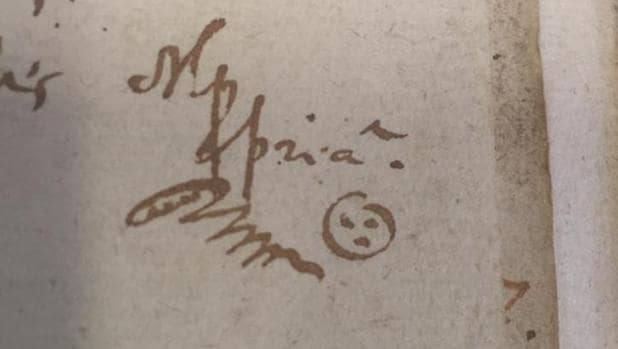 Dibujo que recuerda a un «smiley» junto a una firma en un documento de 1635