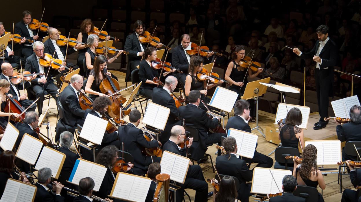 Los músicos de la Orquesta Nacional de España, durante un concierto