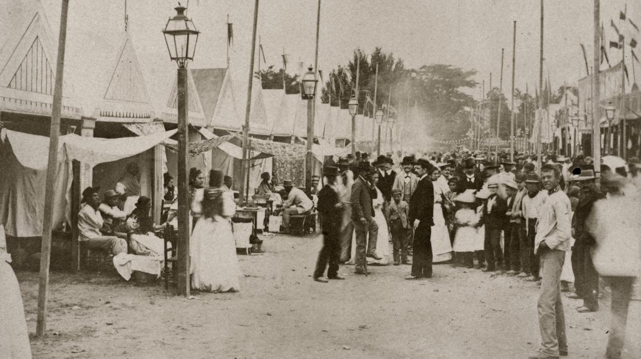 La Feria de Abril, con los puestos de buñoleras, a finales del siglo XIX