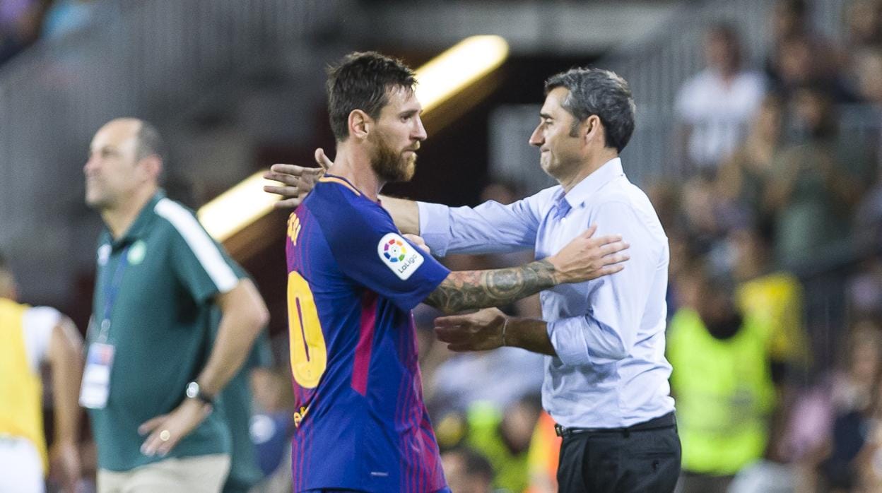 Leo Messi y Valverde durante un partido del Barcelona