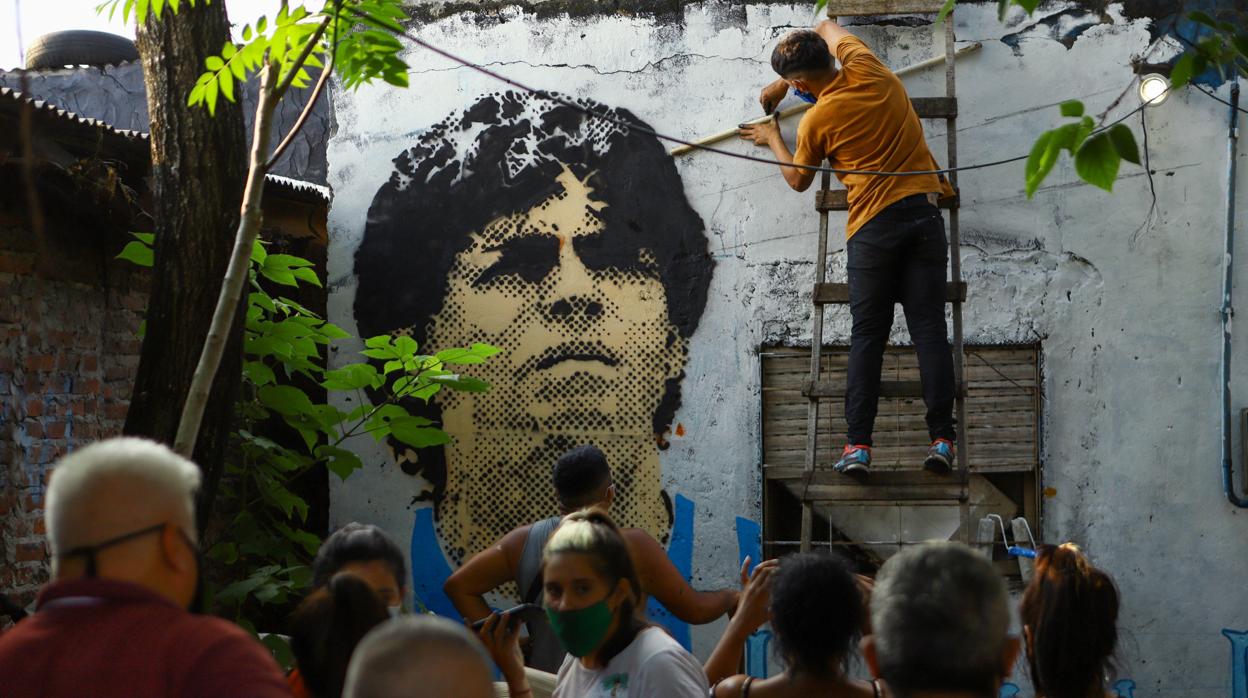 La imagen de Maradona preside la humilde casa de Villa Fiorito en la que vivió