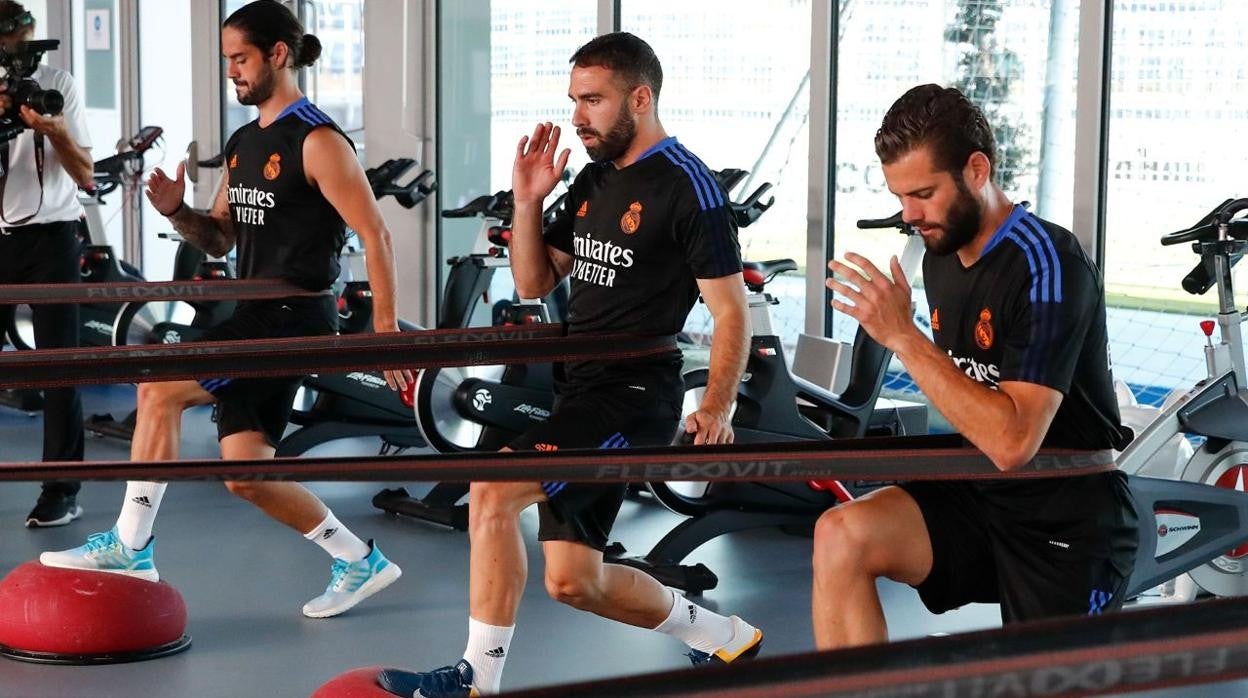 Isco, Carvajal y Nacho, durante el entrenamiento de hoy