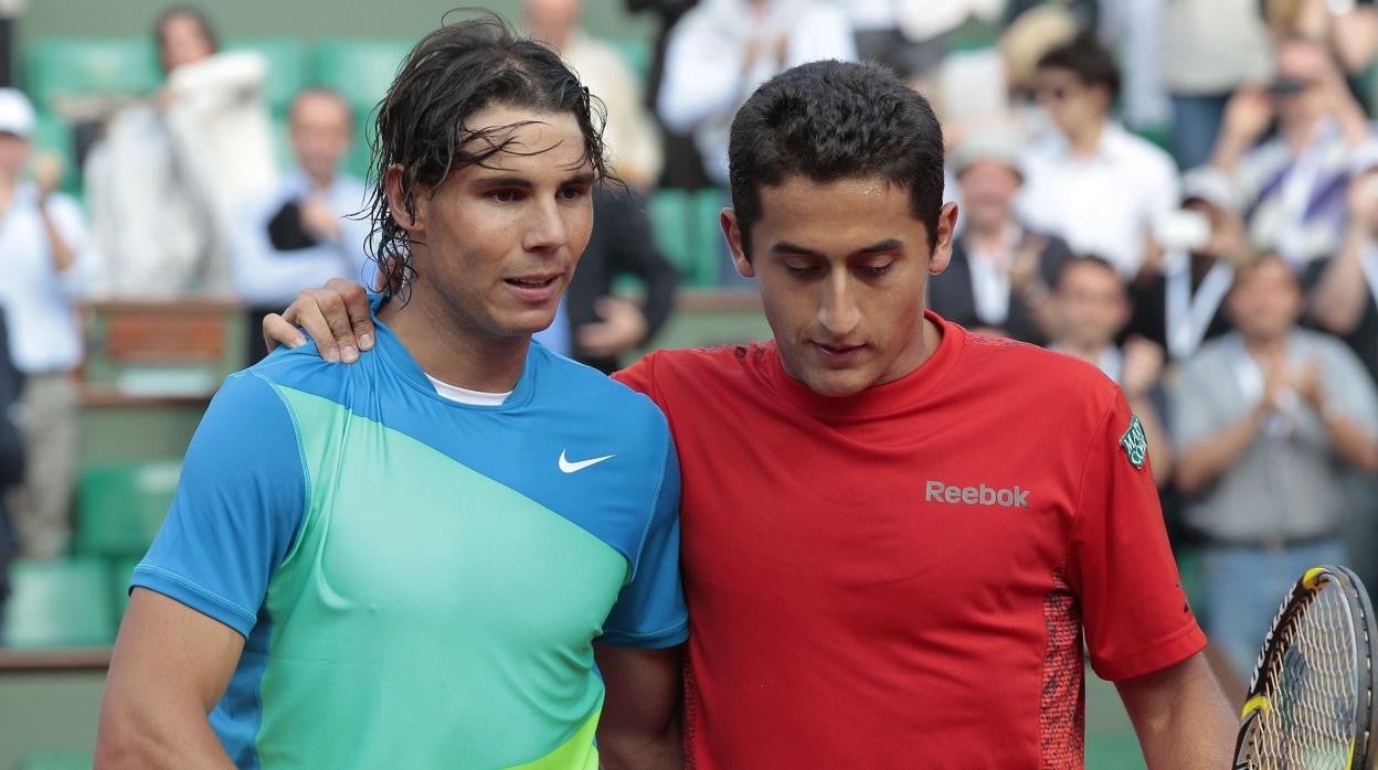 Nadal y Almagro, tras un partido de Roland Garros