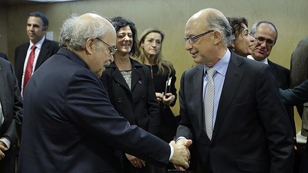El consejero de Economía, Andreu Mas-Colell y el ministro de Hacienda Cristóbal Montoro