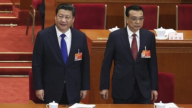El presidente chino, Xi Jinping (izda), y el primer ministro, Li Keqiang,