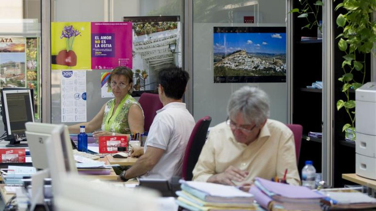 Funcionarios en su lugar de trabajo