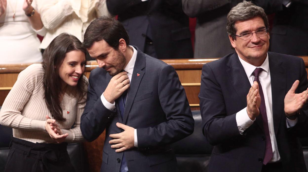 La ministra de Igualdad, Irene Montero, el ministro de Consumo, Alberto Garzón, y el titular de Seguridad Social, José Luis Escrivá