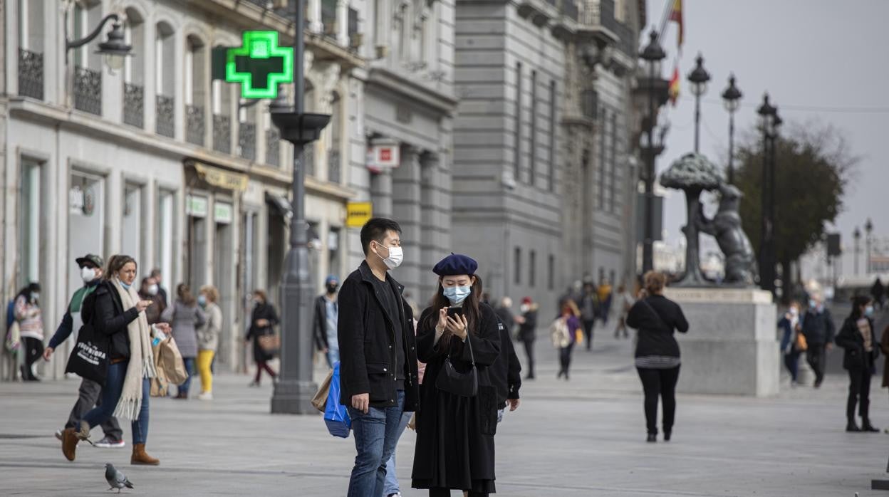 Turistas en Puerta del Sol (Madrid)