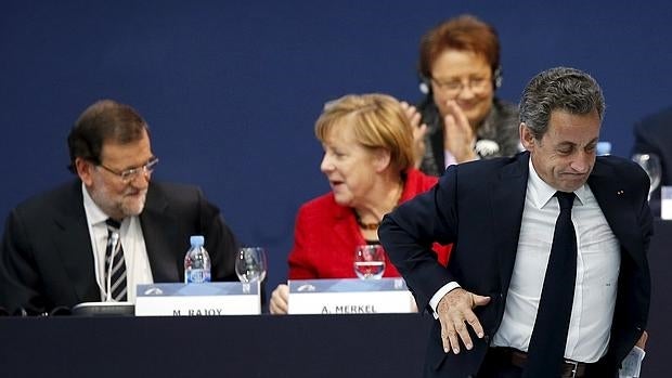 Rajoy, Merkel y Sarkozy