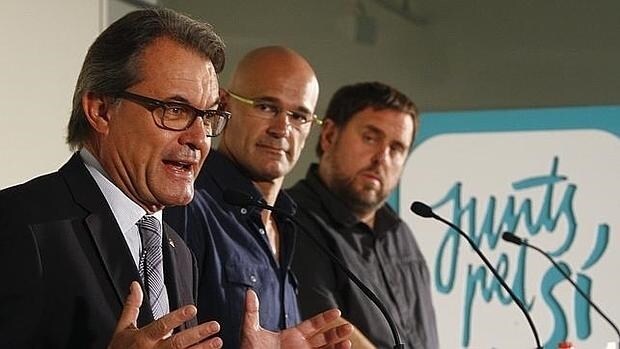 Artur Mas, Raül Romeva y Oriol Junqueras, en un acto de Junts pel Sí