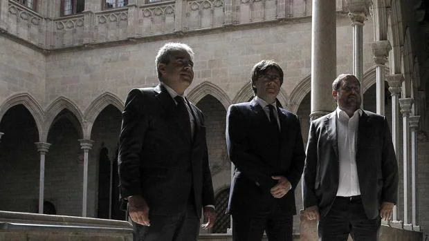Homs, Puigdemont y Junqueras, esta mañana en el Palau de la Generalitat