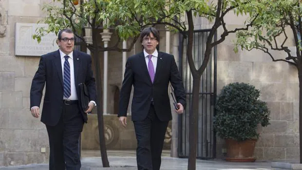 Jordi Jané y Carles Puigdemont