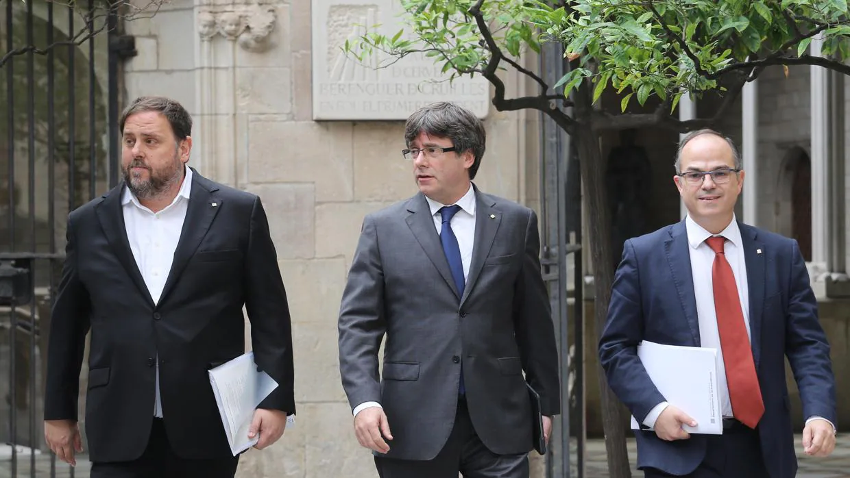 Carles Puigdemont Oriol Junqueras y Jordi Turull