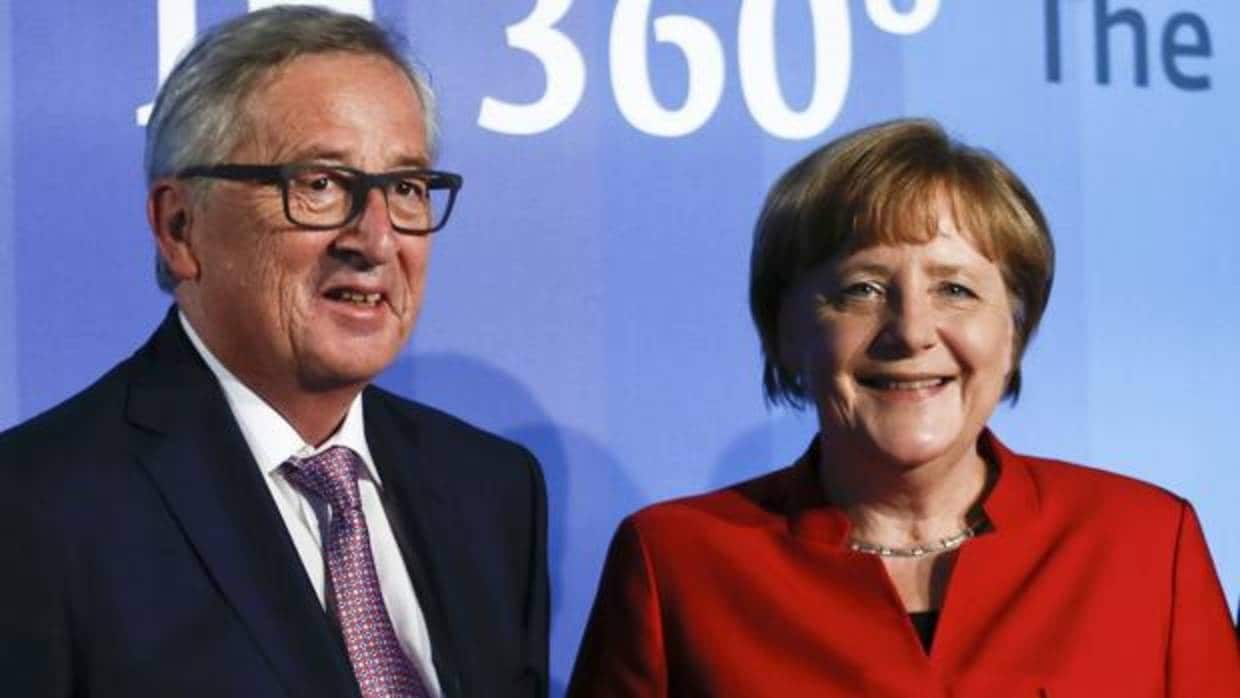 Merkel trata con Juncker el impacto negativo de la crisis catalana en la economía de España
