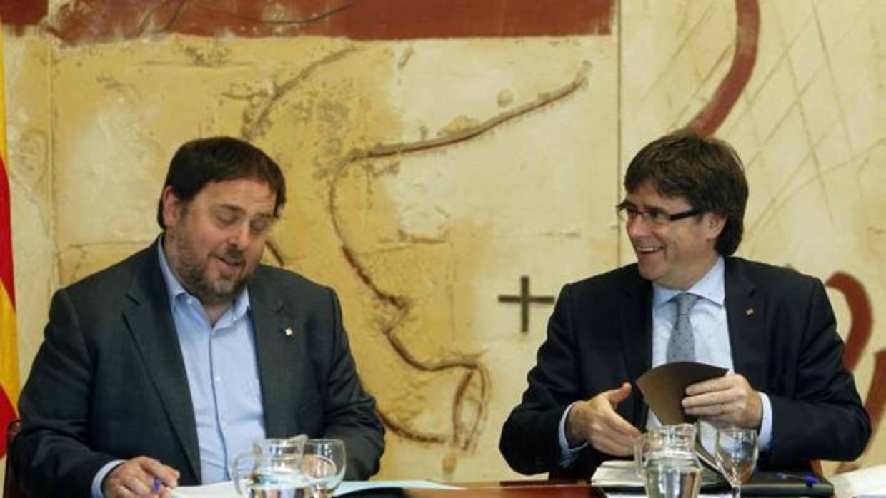 Oriol Junqueras y Carles Puigdemont en marzo del 2016
