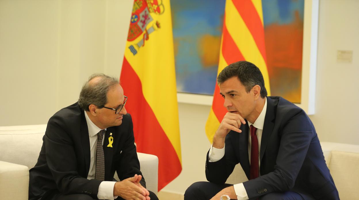 Imagen de la reunión entre Pedro Sánchez y Quim Torra