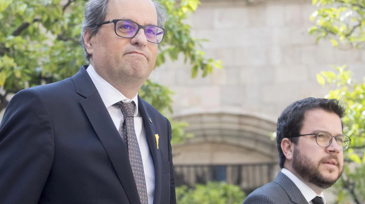 El presidente Quim Torra (Junts per Catalunya) y Pere Aragonés (ERC)