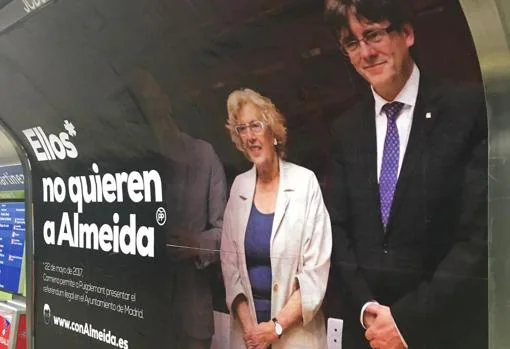 Carmena y Puigdemont en la campaña de Metro de Almeida