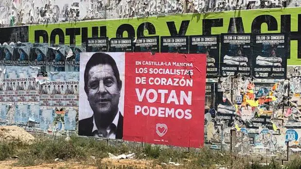 Podemos pide el voto en Castilla-La Mancha en un cartel con la cara de Page