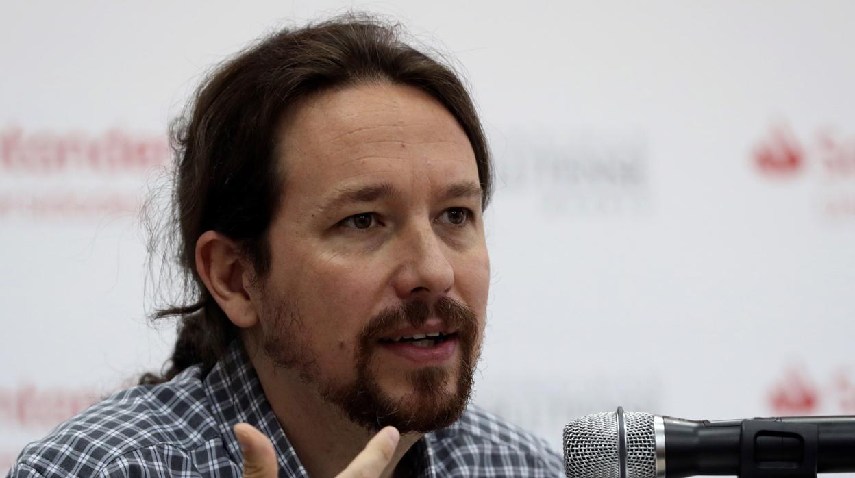 El líder de Podemos, Pablo Iglesias, durante la inauguración de uno de los cursos de verano de El Escorial