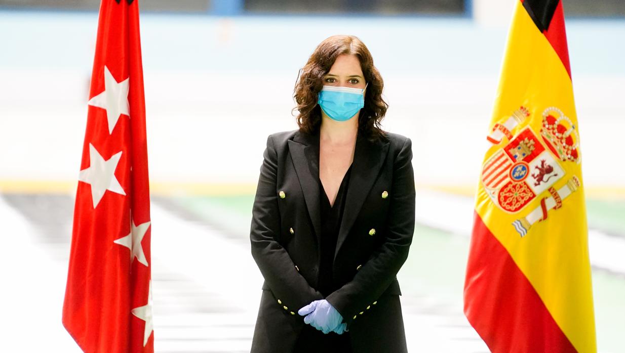 La presidenta de la Comunidad de Madrid, Isabel Díaz Ayuso, con mascarilla durante un acto institucional