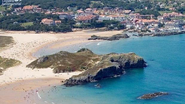 Un bombero de Toledo ayuda a recuperar a una mujer de una parada cardiorespiratoria en la playa cántabra de Ris