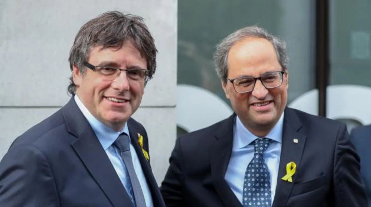 Carles Puigdemont junto a Quim Torra