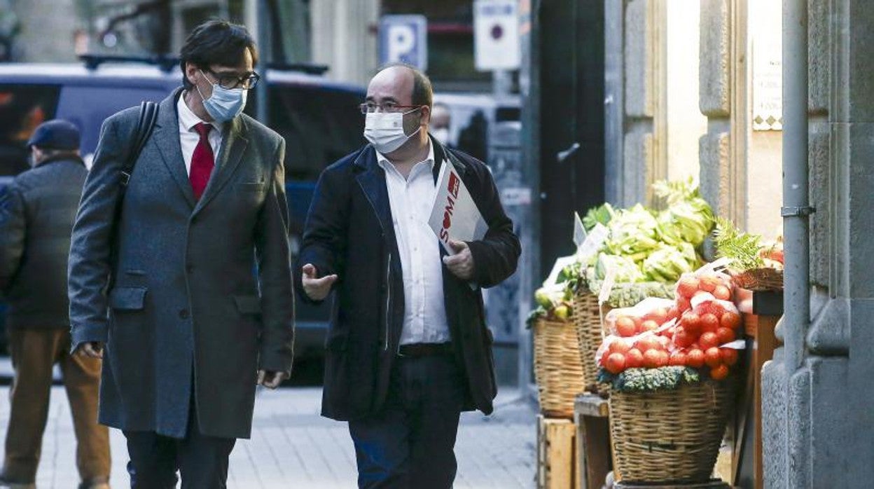 El hasta hoy ministro de Sanidad, Salvador Illa, y el líder del PSC y nuevo ministro de Política Territorial, Miquel Iceta